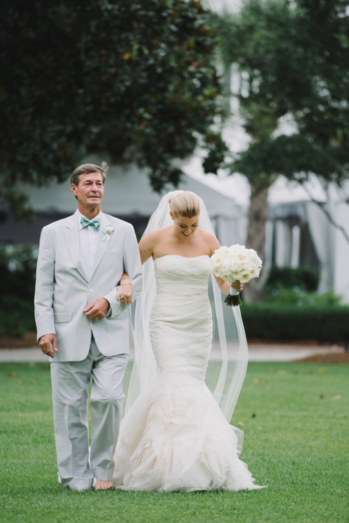 Bride’s gown by Vera Wang. Father of the bride’s suit by Hardwicks. Floral by Tiger Lily Weddings. Photograph by Sean Money + Elizabeth Fay at Lowndes Grove Plantation.