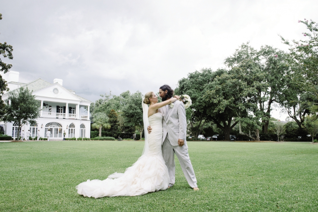 THE MODERN SOUTH: Julie donned a Vera Wang gown  with a flowing skirt while Lee chose gray seersucker.