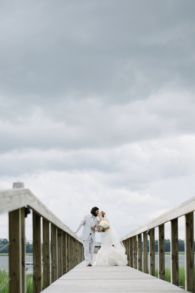 His &amp; Hers: “He wears camo and I wear five-inch heels,” says Julie. “While I dreamed flowers, chandeliers, and china, he would have been happy in a field with a pig picking! Since the day was about us, we put it all together.”