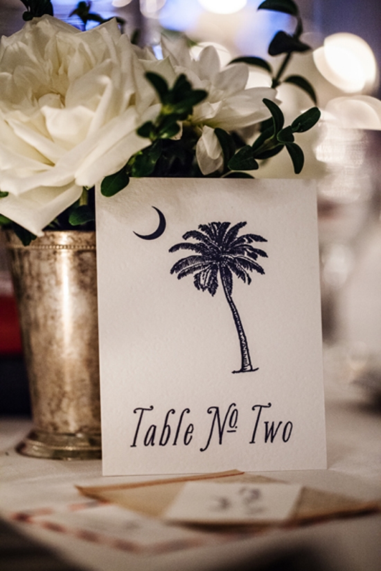 SOUTHERN SMILE: ….While the Holy City’s signature Palmetto (here, next to a julep cup-turned-bud-vase) was a reminder of the bride’s South Carolina roots.