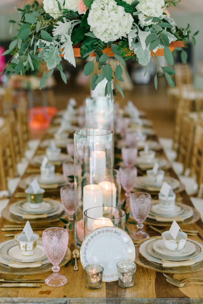 Photograph by Sean Money + Elizabeth Fay. Florals by A Charleston Bride. Tableware by Polished!. Signage by Sarah Drake Design.