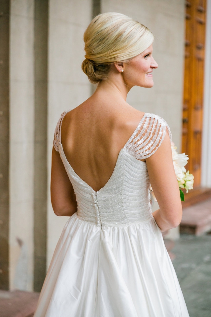 Bride&#039;s gown by Modern Trousseau. Hair by Patrick Navarro. Makeup by Bellelina. Photograph by Dana Cubbage Weddings.