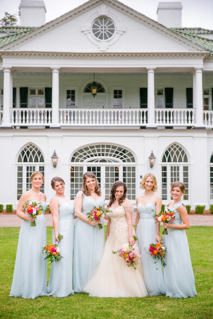 Bride&#039;s gown by Monique Lhuillier, available in Charleston through Maddison Row. Florals by Branch Design Studio. Bridesmaid gowns by Amsale from Bella Bridesmaids. Image by Dana Cubbage Weddings at Lowndes Grove Plantation.