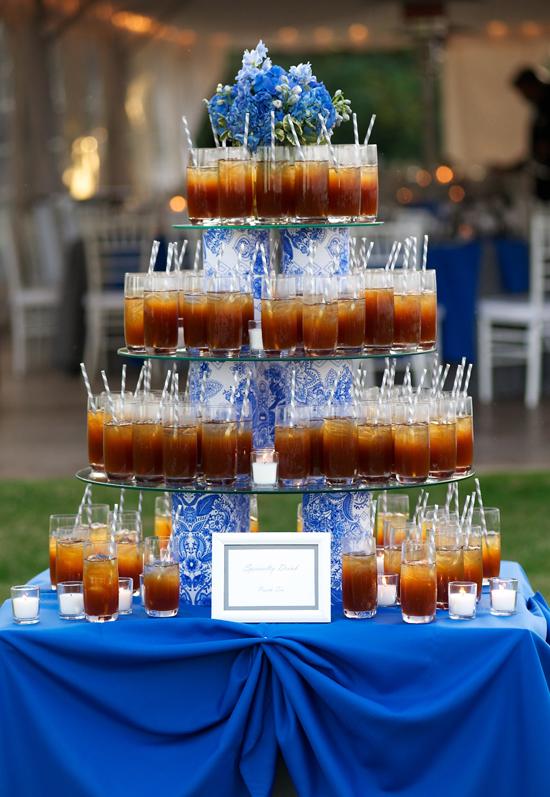 CHEERS: The tiered beverage display featured the “sea oats” motif and was topped with fresh flora.