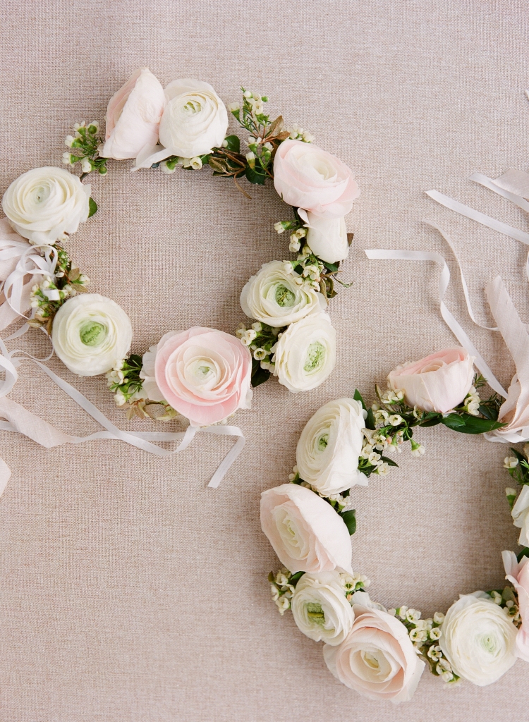 Flower girls donned sweet crowns of cream and pale pink ranunculus. &lt;i&gt;Image by Lucy Cuneo Photography&lt;/i&gt;