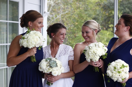 Bridesmaids wore vintage-inspired tea-length gowns.