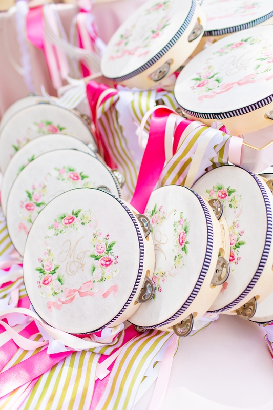 The bride hand-decorated 200 tambourines as guest favors.
