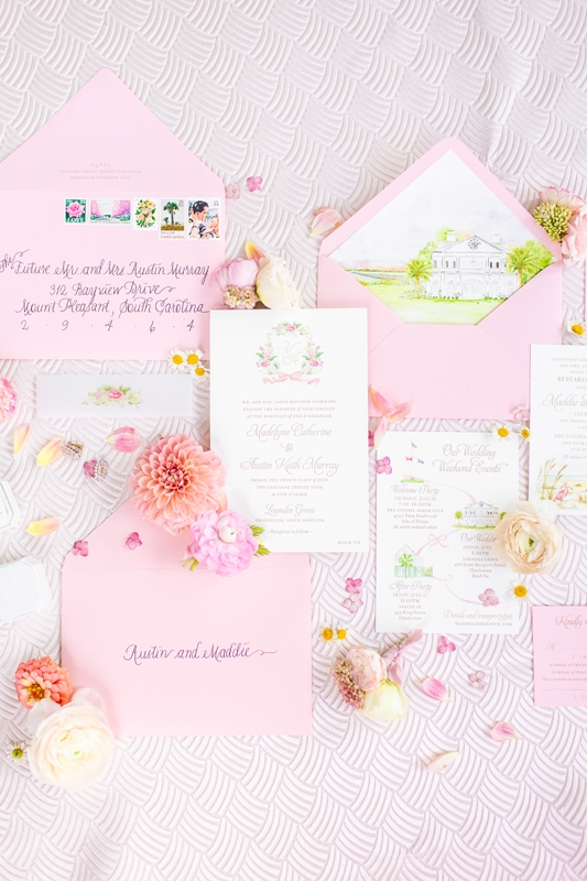 Studio R designed the watercolor wedding crest that appeared on the invitation and beyond.
