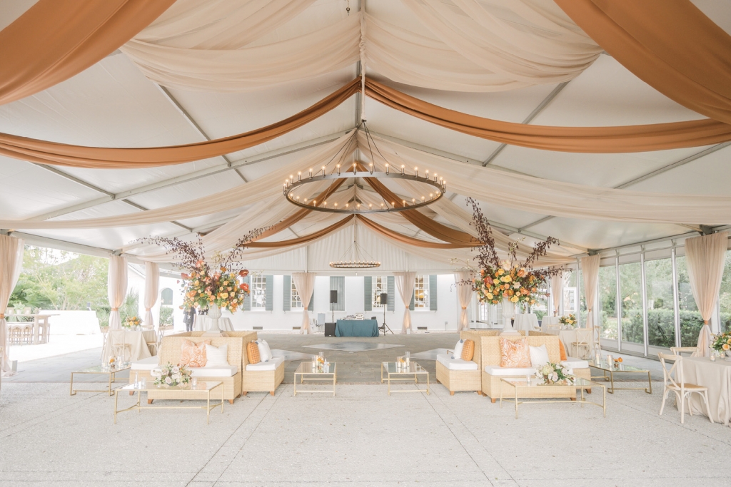 Cinnamon-hued accents and tent swags brought a seasonal touch to the reception area. The blue accents were a subtle nod to Brian’s alma mater, Penn State.