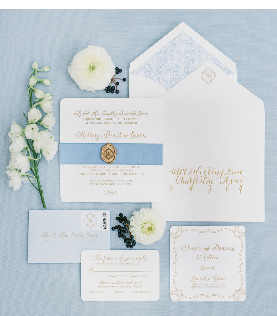 The invitation suite by Sixpence Press included envelope liners that echoed the pattern from the table linens.