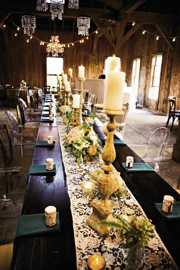 LIGHT BRIGHT: Tall pillar candles, votives, and bistro lights created an intimate glow throughout the Cotton Dock.