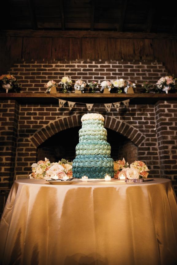 OMBRÉ EFFECT: Tammy Kasarda of Cakes by Kasarda iced the cake in thick rosette ribbons that graduated from a rich teal to white. “When we tried Tammy’s cakes, she won our hearts,” Amanda says.