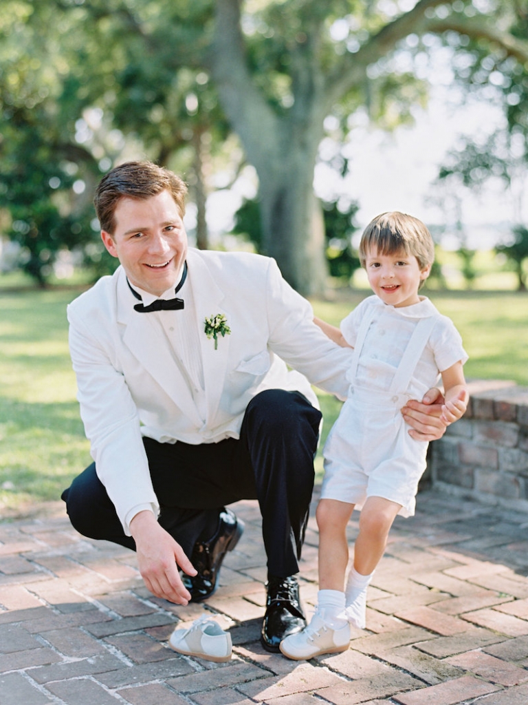 Groom&#039;s attire from Mens Wearhouse. Ring bearer&#039;s attire by Florence Eiseman. Image by Ryan Ray Photography at Lowndes Grove Plantation.