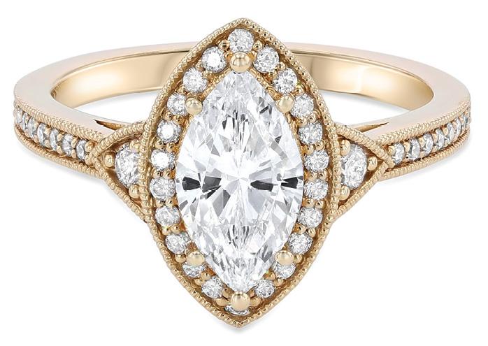 Vintage Milgrain marquise diamond ring accented with .31 total cts. round diamonds set in 14K yellow gold from Diamonds Direct ($1,970)