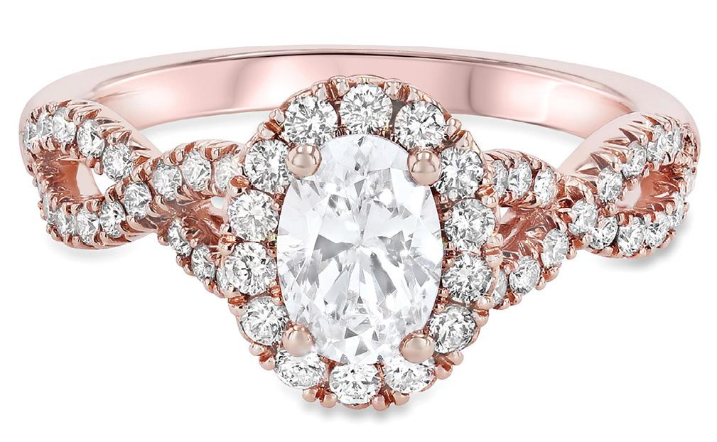 Contemporary oval diamond accented with round diamonds (.56 total cts.) in 14K rose gold from Diamonds Direct ($1,850)