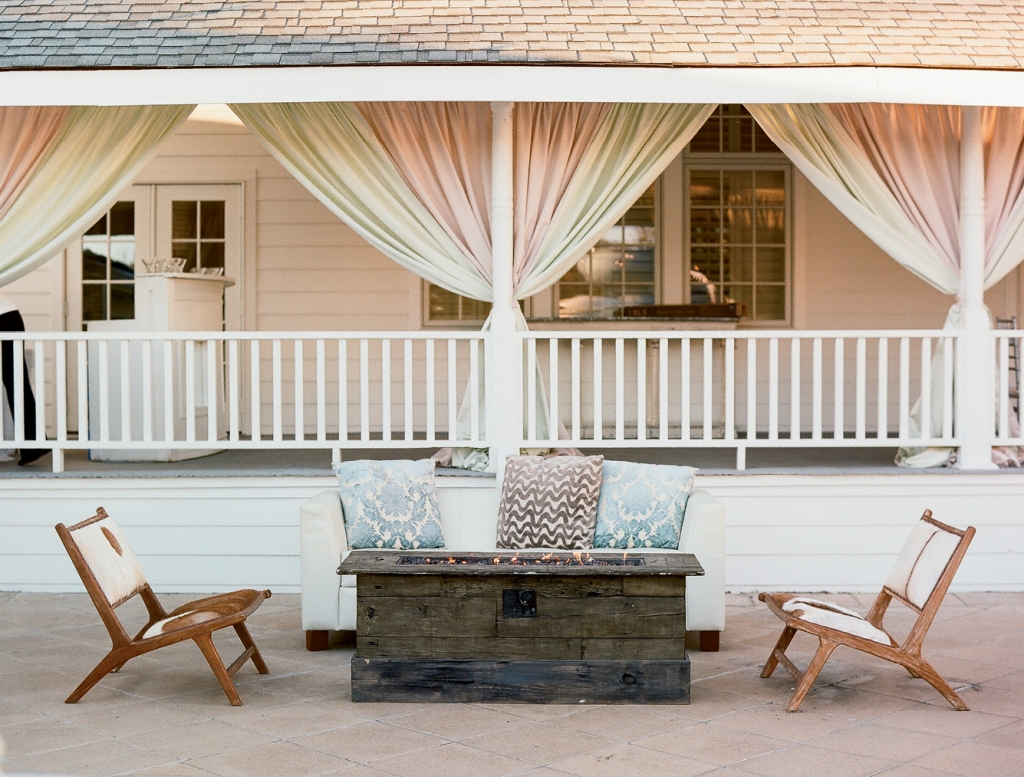 One way to make a large, open space feel more intimate? Add curtains, as Ooh! Events did to the porches.