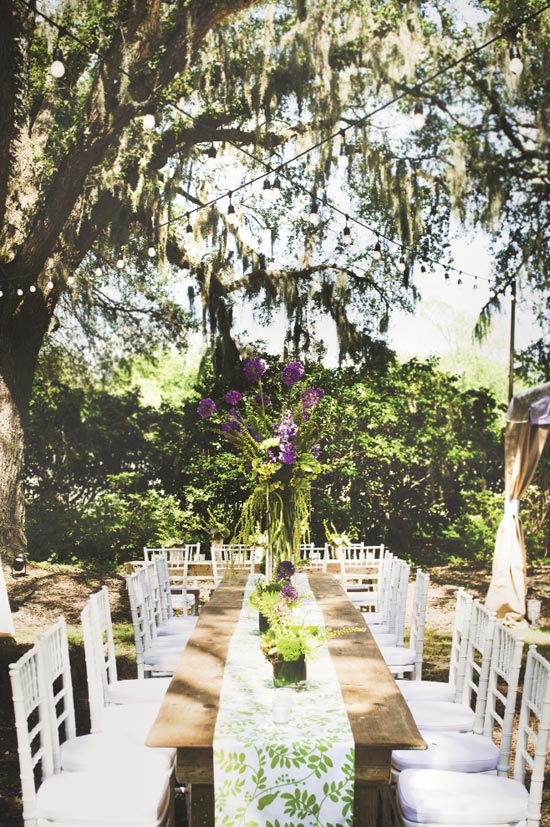 TALL ORDER: Katharine fell in love with the humble, long-stemmed allium (garlic plant), and its purple blooms inspired the wedding’s dominant colors: green and lavender.
