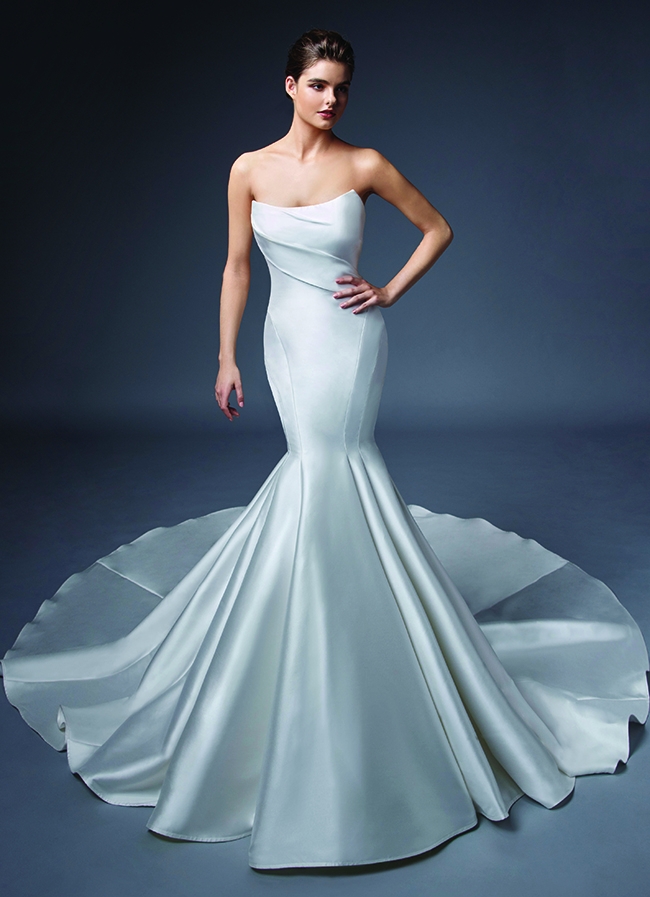 Clean Lines - “Seraphine” gown by ÉLYSÉE Why We Love It “A contouring,  dramatic, and high fashion feel”  –Jessica Kiss, Verità