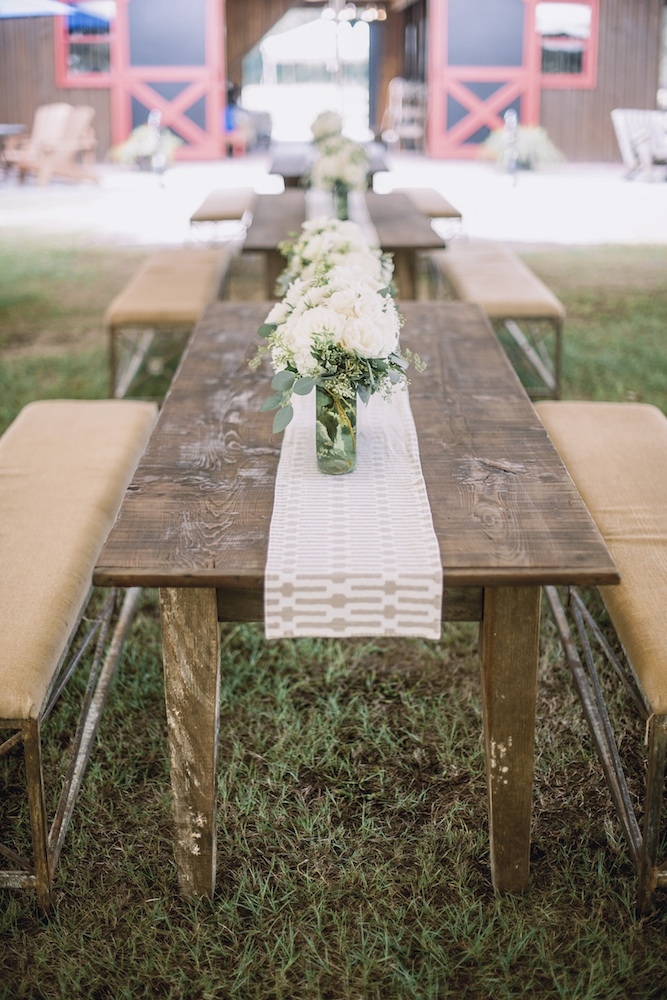 Wedding design and décor by Ooh! Events. Florals by Out of the Garden. Image by Timwill Photography at Hyde Park Farm &amp; Polo Club.