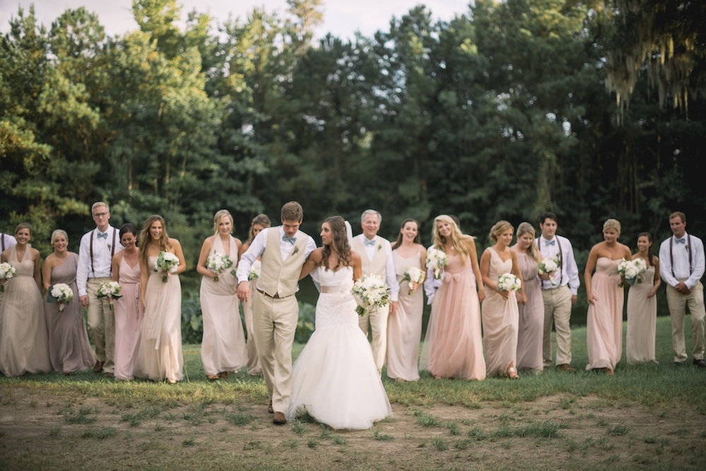 Bride&#039;s gown by Legends by Romona Keveza (available locally through Maddison Row). Bridesmaid dresses from Bella Bridesmaids. Menswear by Calvin Klein. Florals by Out of the Garden. Image by Timwill Photography.