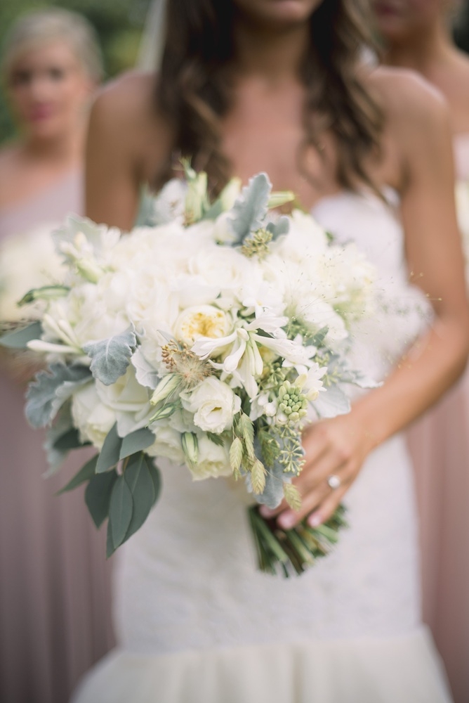 Florals by Out of the Garden. Bride&#039;s gown by Legends by Romona Keveza (available locally through Maddison Row). Image by Timwill Photography.