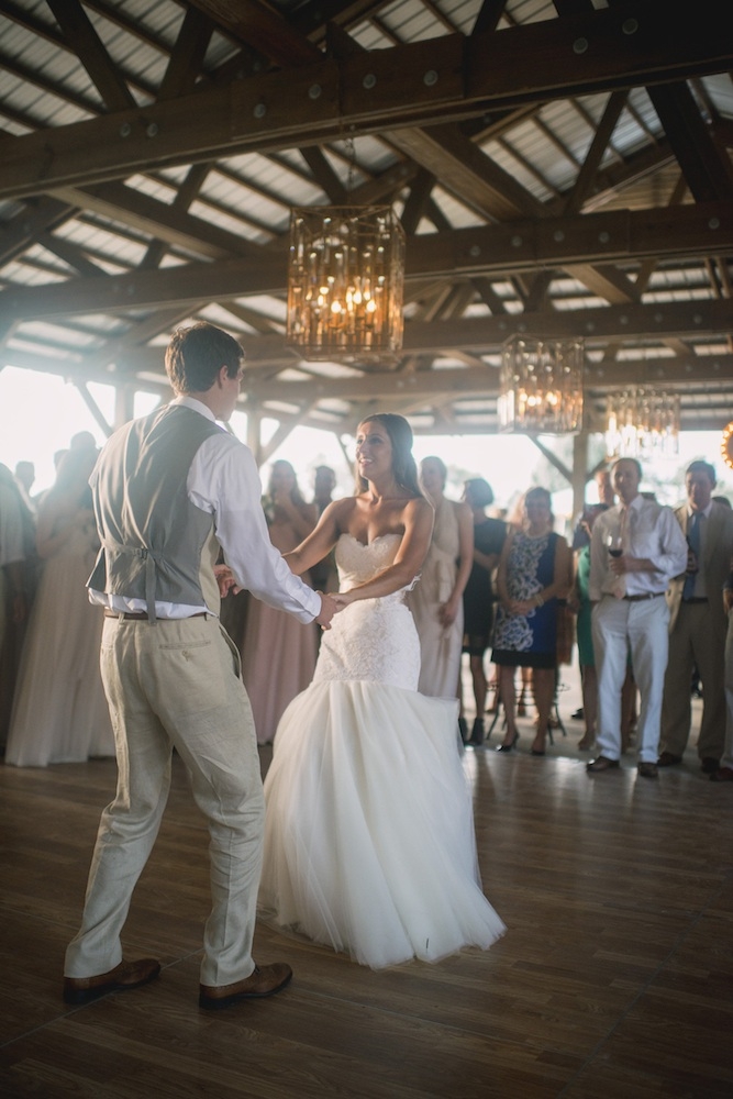 Bride&#039;s gown by Legends by Romona Keveza (available locally through Maddison Row). Groom&#039;s suit by Calvin Klein. Image by Timwill Photography at Hyde Park Farm &amp; Polo Club.