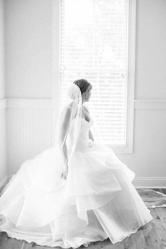 Bride&#039;s gown by Issa. Image by Corbin Gurkin Photography.
