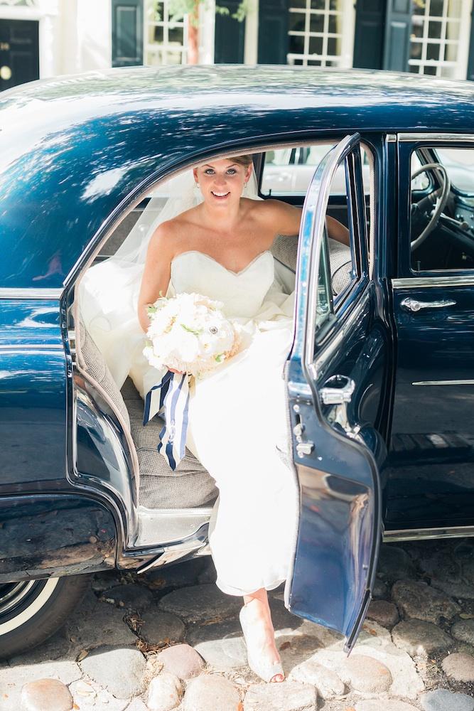 Vehicle from Lowcountry Valet &amp; Shuttle Co. Bride&#039;s gown by Issa. Image by Corbin Gurkin Photography.