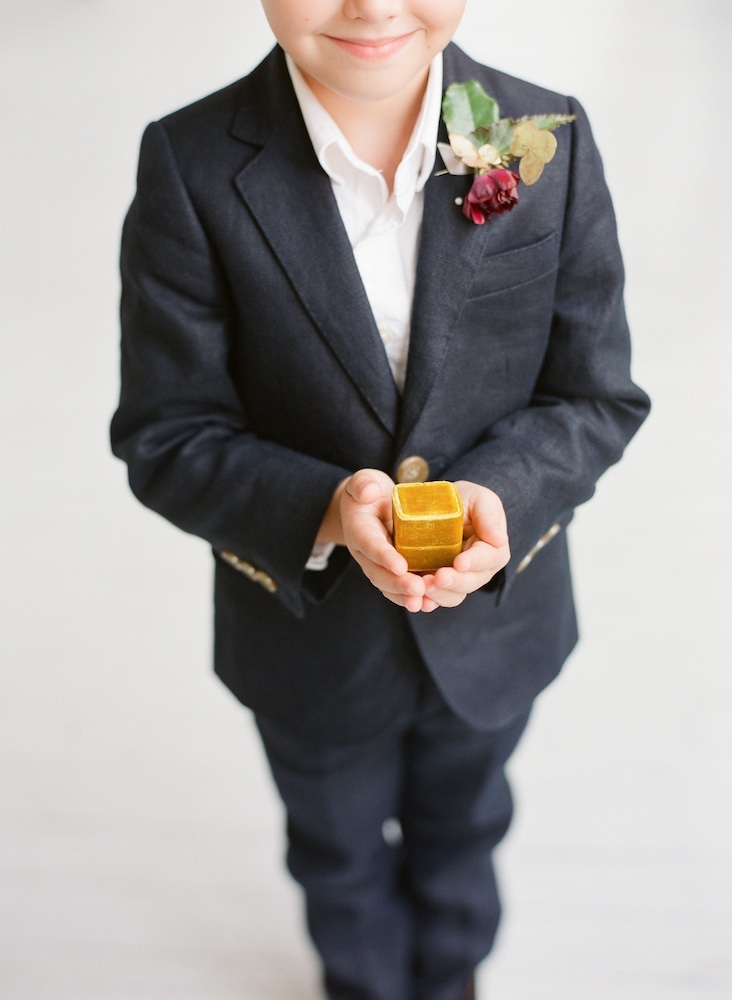 Ring bearer&#039;s suit from J.Crew. Boutonniere by Charleston Stems. Image by Corbin Gurkin Photography.