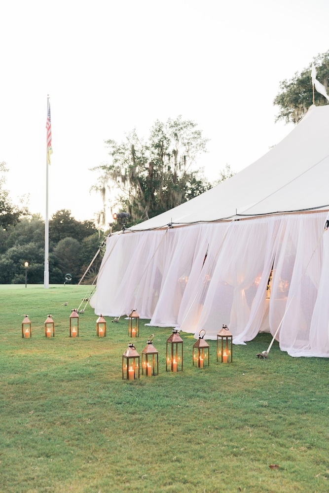 Tent by Sperry Tents Southeast. Wedding design by Easton Events. Image by Corbin Gurkin Photography at Yeamans Hall Club.
