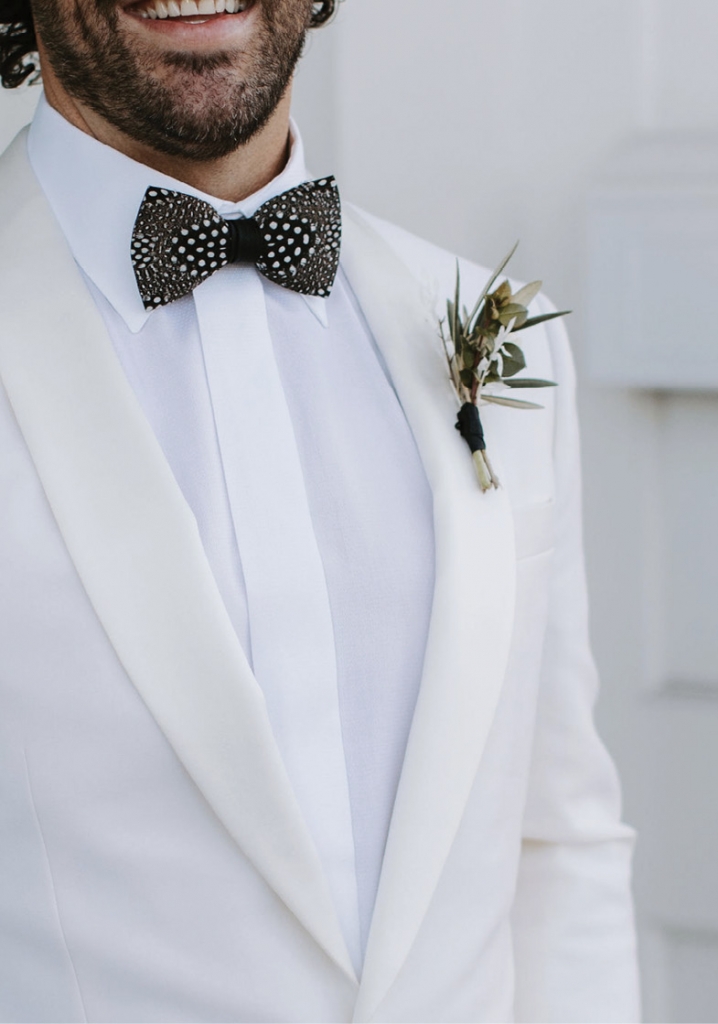 The flowers by Roadside Blooms balanced drama with simplicity, as did Mattie’s statement bow tie by Brackish, set against his white J. Crew suit jacket.