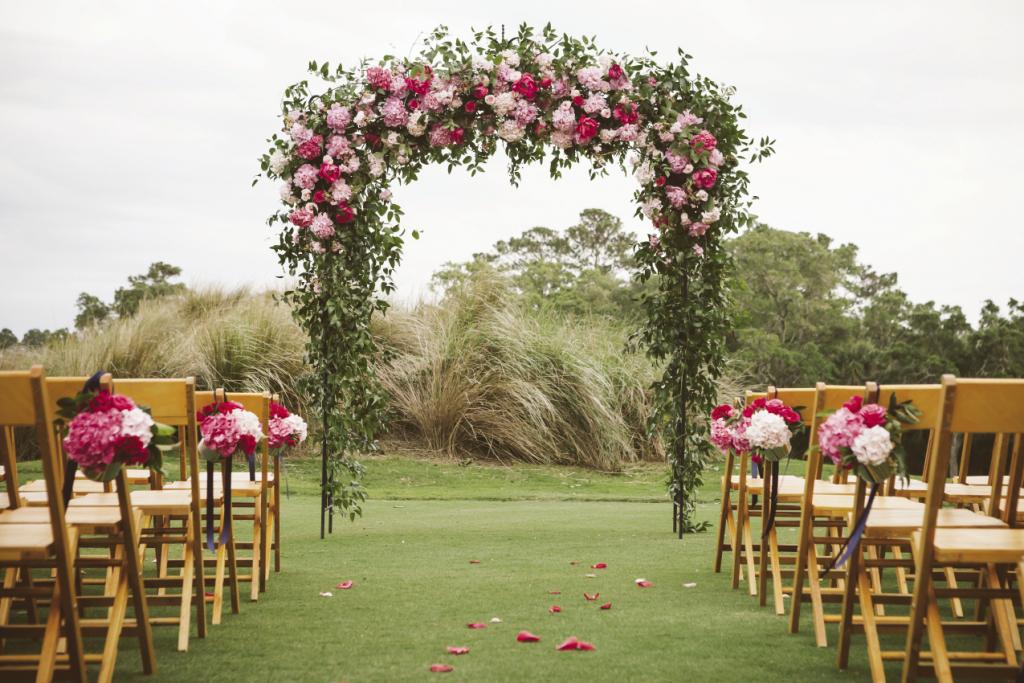 WALK THIS WAY: Again inspired by Shannon’s Pinterest board, Gathering covered an arbor with a garden of pink hydrangeas, peonies, and roses.