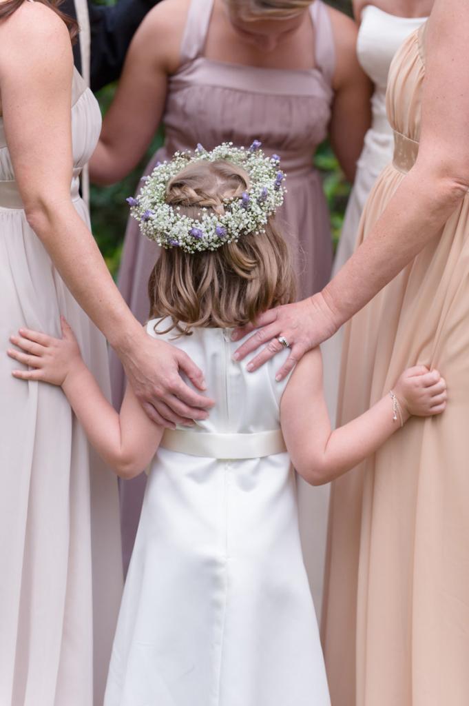 Bridesmaid’s attire from Jean’s Bridal. Flower girl dress from Janie and Jack. Florals by Forget Me Nots by Horst Florist. Image by Anne Liles Photography.