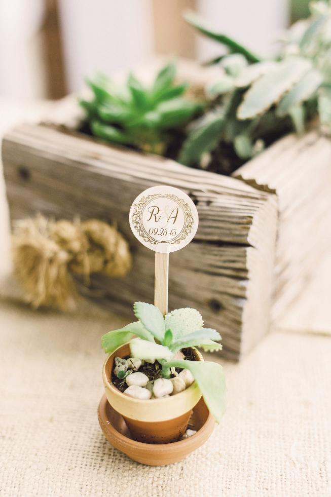 TAG, YOU&#039;RE IT: Monogrammed sticks transformed miniature pots into thematic décor.