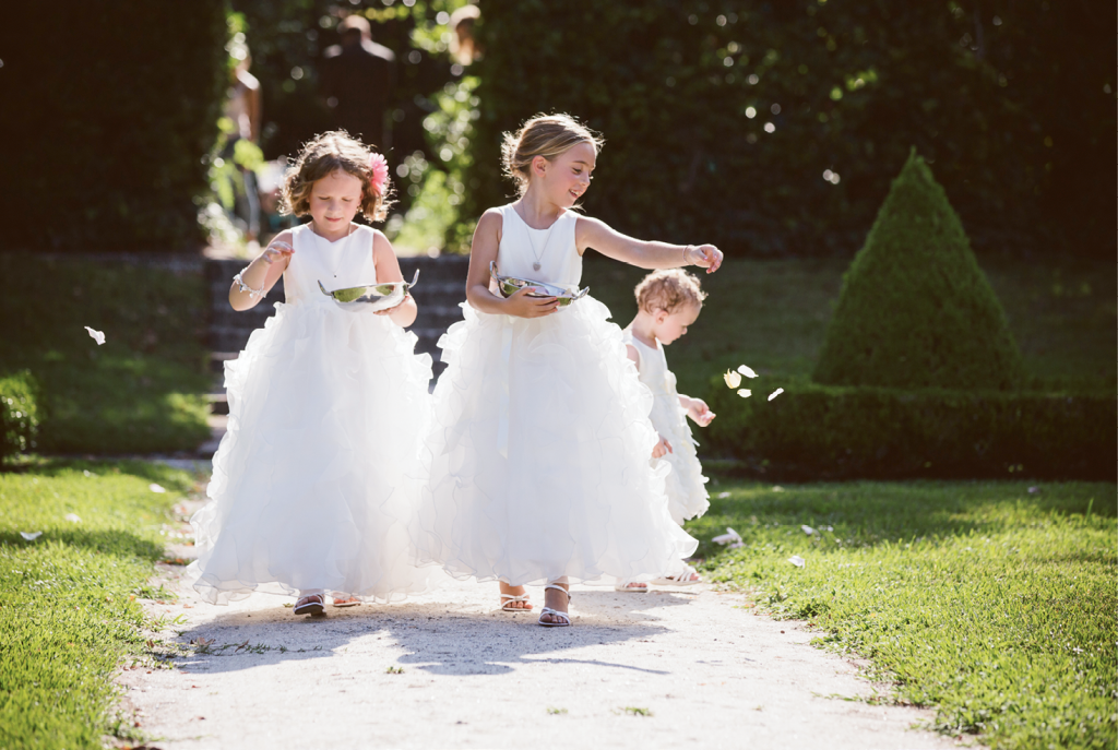 Catherine’s nieces’ ruffled flower-girl frocks were  pint-sized nods to her own tulle gown. &lt;i&gt;Amelia + Dan Photography&lt;/i&gt;
