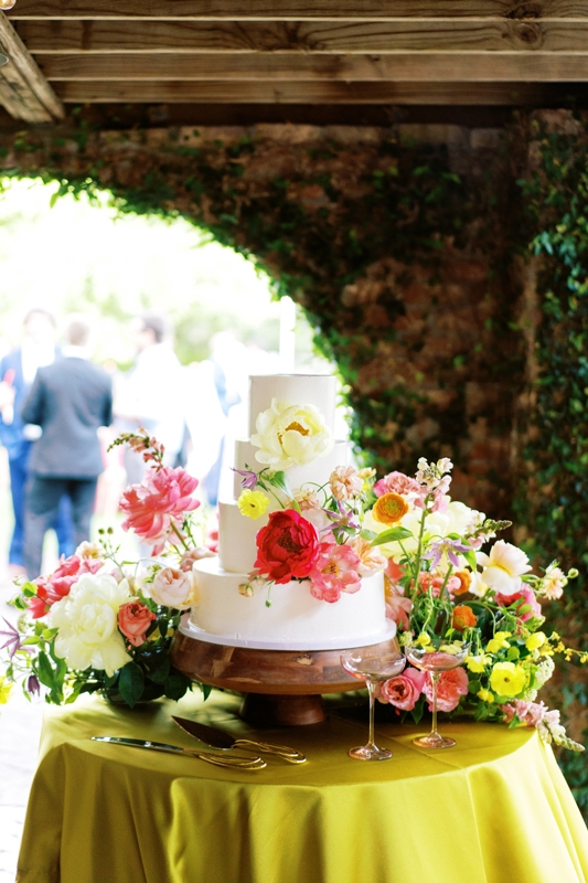 The wedding cake featured layers of almond, lemon, and red velvet cloaked in Italian buttercream frosting.