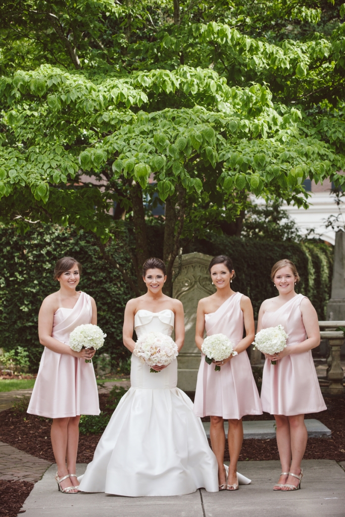 Bride&#039;s gown by Carolina Herrera (available locally at Fabulous Frocks). Bridesmaid dresses by Lela Rose (available locally at Bella Bridesmaids). Florals by Sara York Grimshaw Designs. Photograph by amelia + dan.