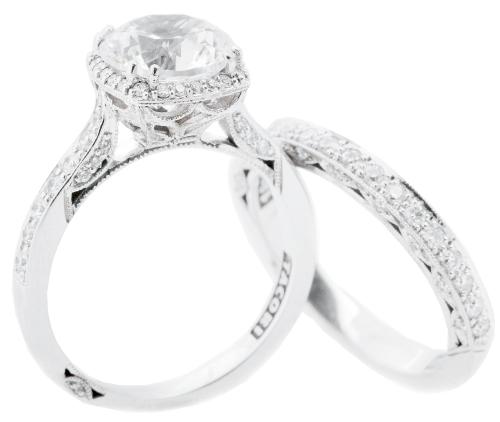 Tacori’s 18K white gold ring with 2 ct. diamond and accent diamonds (.37 total cts.) and 18K white gold band with diamonds (.29 total cts.), both from Polly’s Fine Jewelry; $28,000 and $2,870,  respectively (Also available through Croghan’s Jewel Box and REEDS Jewelers.)