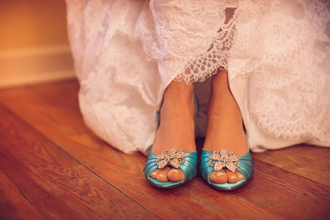 SOMETHING BLUE: The bride slipped into a pair of something blue. Check out how stunning the turquoise looks with the red that infused the big day.