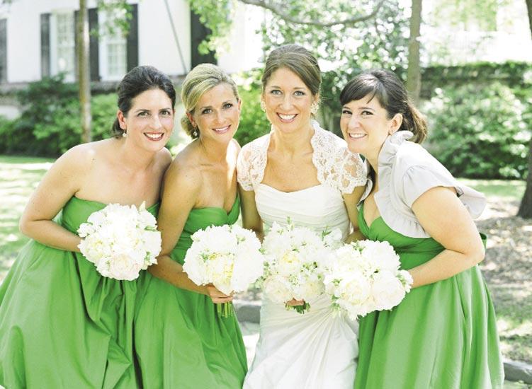 IT’S A FAMILY THING: Jessica’s cousins and elder sister stayed cool in strapless kelly green bridesmaid frocks from BHLDN, Anthropologie’s new bridal line.