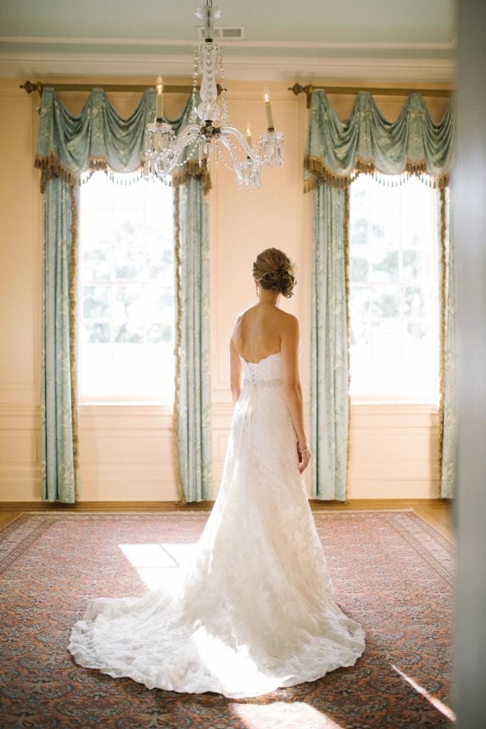 Bride&#039;s gown by Maggie Sottero (available locally at Bridals by Jodi). Hair by Paper Dolls. Image by Clay Austin Photography.