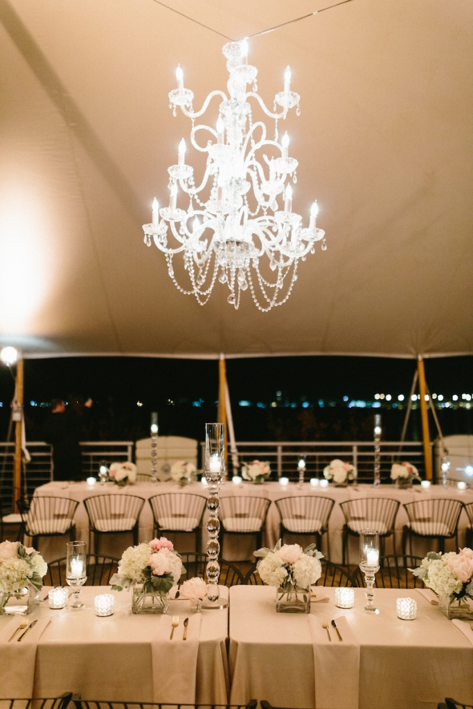 Wedding design by Fini Event Planning and Inventive Environments. Tent by Sperry Tents Southeast. Rentals from Snyder Events, EventWorks, and EventHaus. Lighting by Innovative Event Services. Image by Clay Austin Photography at Harborside East.