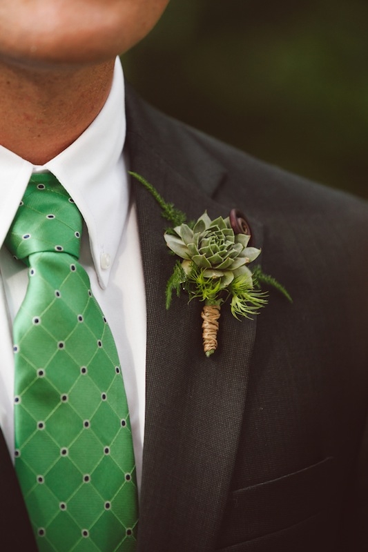 Groom’s attire by Jos A. Bank. Boutonniere by Heidi Inabinet of On a Limb. Image by Amelia + Dan Photography.
