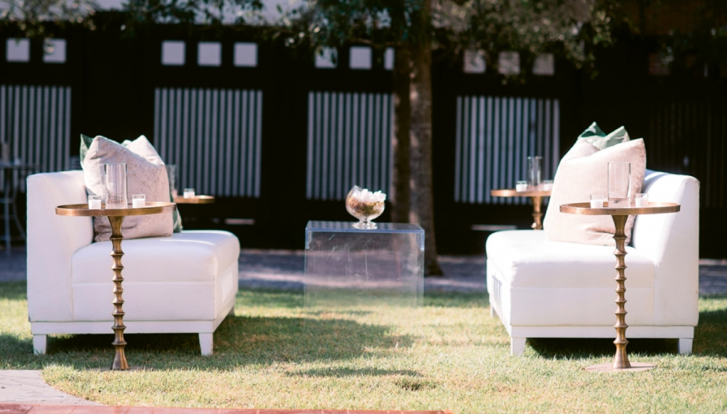 Sleek lounges with Lucite and gold tables mimicked the understated glamour of the décor inside the museum and provided comfy conversation areas for guests during the outdoor reception.  &lt;i&gt;Image Timwill Photography&lt;/i&gt;