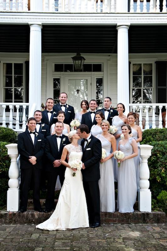 Bridal gown by Lela Rose. Bridesmaids’ attire by Amsale from Bella Bridesmaids. Groom and groomsmen’s attire by Jos. A. Bank. Florals by HB Stems. Image by Kelli Boyd Photography.