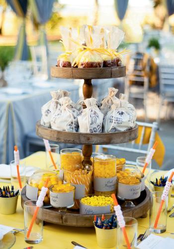 Towering Treats: Calder Clark of Calder Clark Designs fashioned this Halloween-themed kids table for the junior attendees of an October 31 wedding last year.