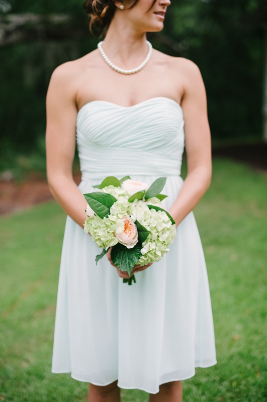 Bouquet by First Bloom of Charleston. Bridesmaid attire through Bella Bridesmaids. Image by Britt Croft Photography.