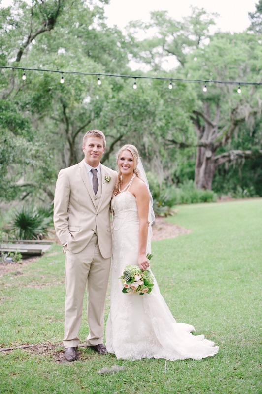 Bride’s gown by WTOO through Bridals by Jodi. Groom’s attire by Men’s Wearhouse. Image by Britt Croft Photography.