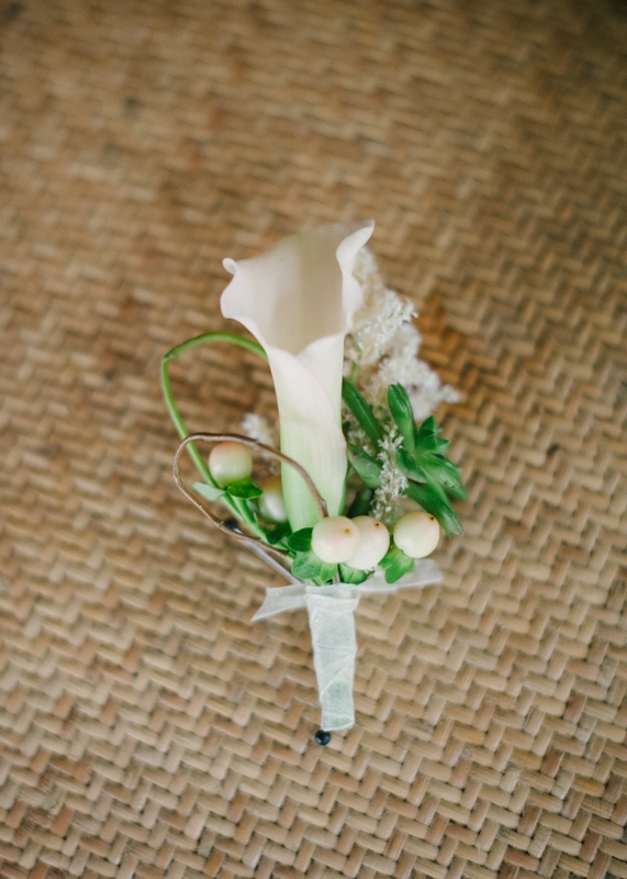 Boutonniere by First Bloom of Charleston. Image by Britt Croft Photography.