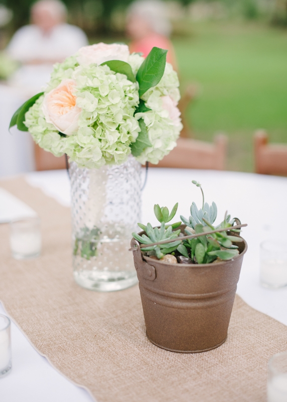 Flowers by First Bloom of Charleston. Wedding design by Ashley Russell of Ashley Nicole Events. Rentals by EventWorks. Image by Britt Croft Photography.
